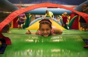 Large inflatables and bounce houses in the Playroom at Milwaukee Yard indoor sports complex Oak Creek WI