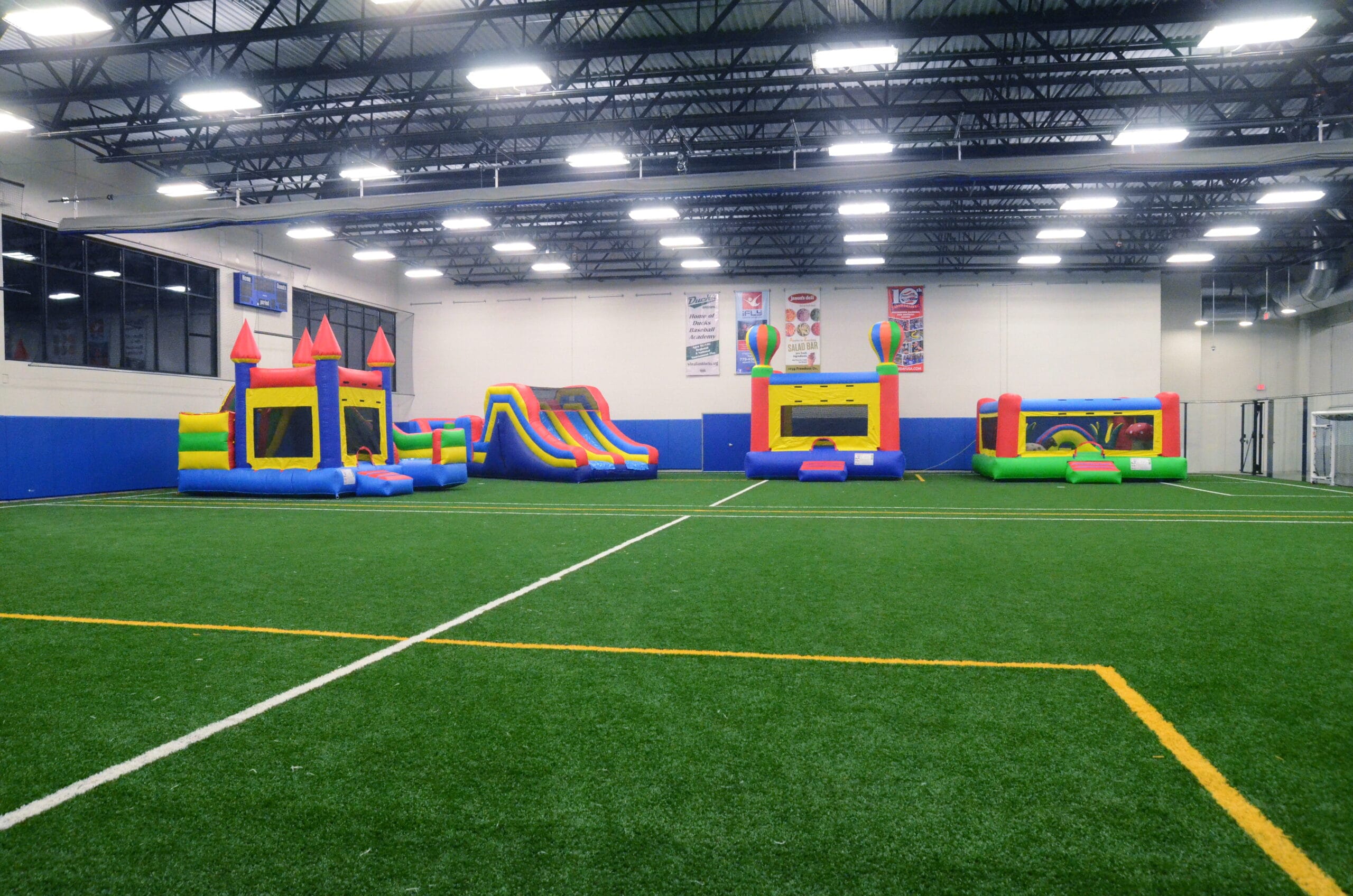 Large inflatable bouncy houses at Milwaukee Yard Oak Creek Playroom every Friday night 6pm to 9pm