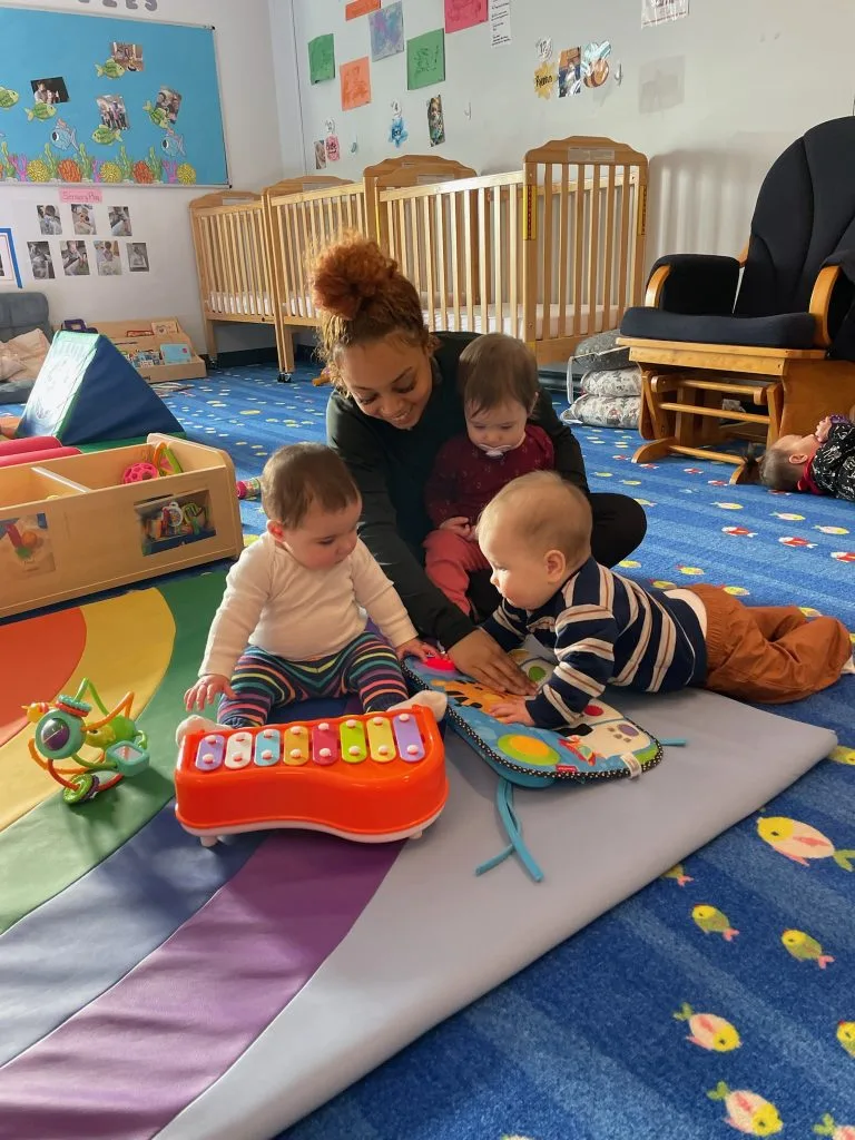 Bright and cheerful infant care room for babies 6 weeks to 15 months at Active Childcare Milwaukee Yard
