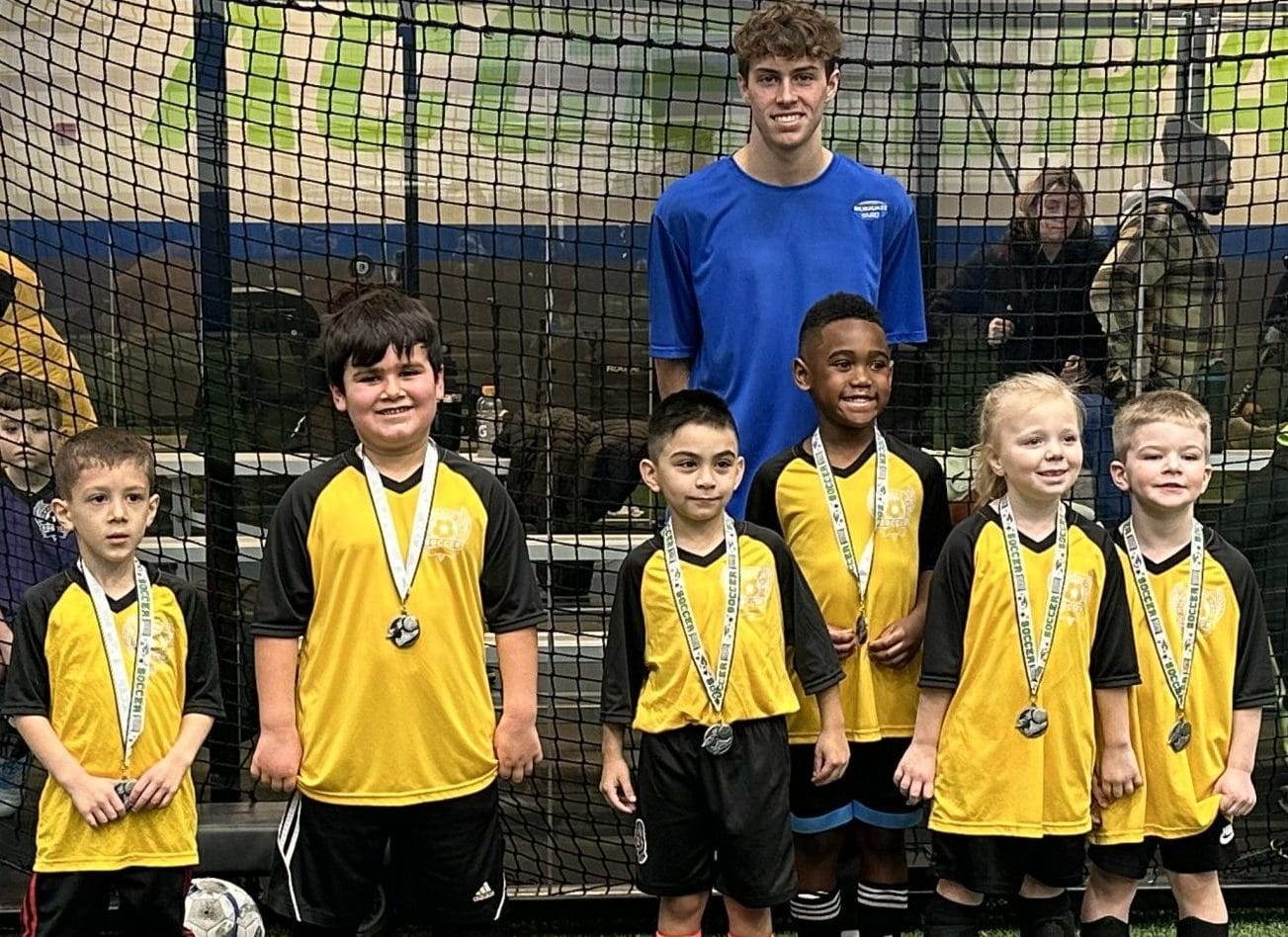 Youth indoor soccer league winners on turf field at Milwaukee Yard in Oak Creek WI