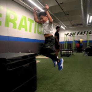 Child jumping on a box with Acceleration at Milwaukee Yard Oak Creek, WI